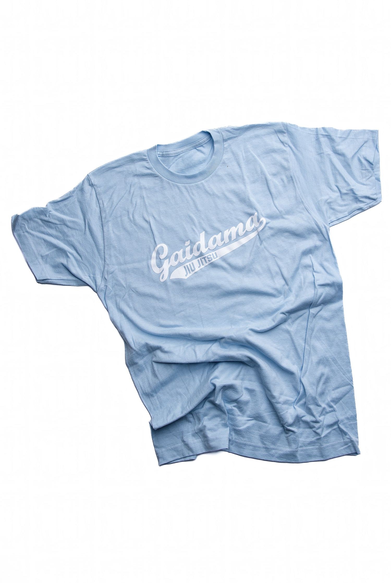 A baby blue t-shirt on a white background featuring the Gaidama Jiu Jitsu baseball sport logo in white across the chest.