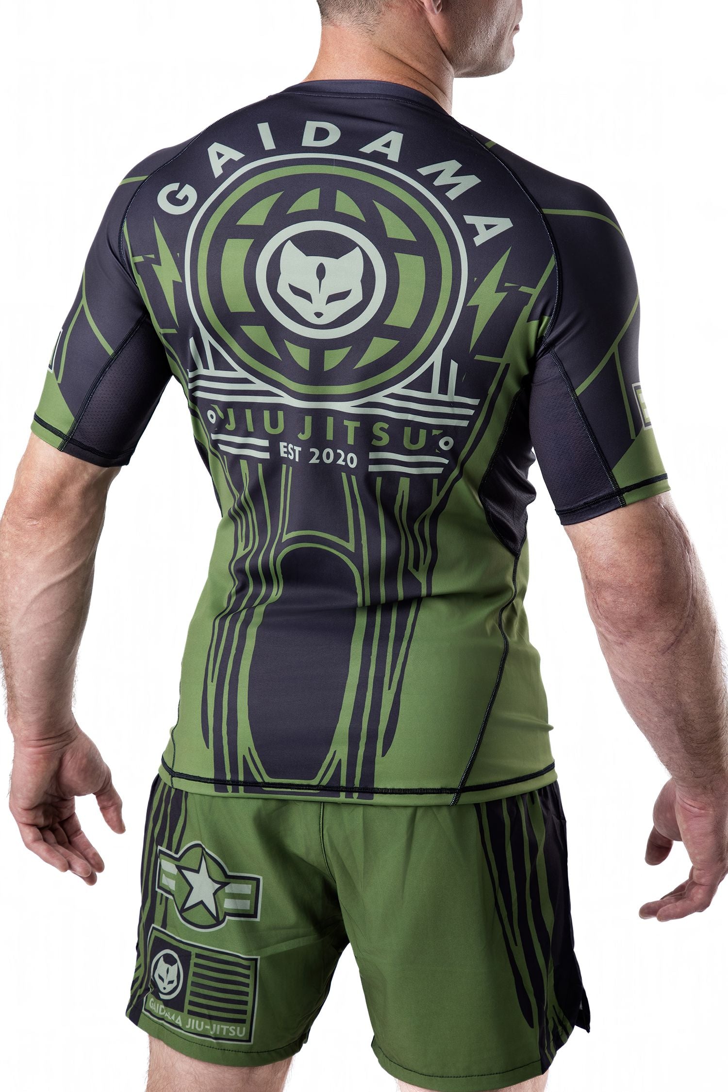 Green and black men's Jiu Jitsu rashguard with Air Force and military inspired details designed in collaboration with nogi BJJ rising star Jett Thompson, back view.