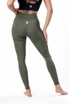 The best and highest rated Jiu Jitsu spats for women in BJJ, featured in Sage green, back view.